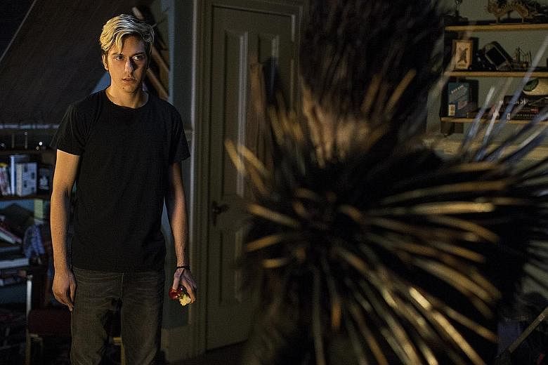 (From far left) Nat Wolff and Willem Dafoe (as god of death Ryuk) in Death Note.