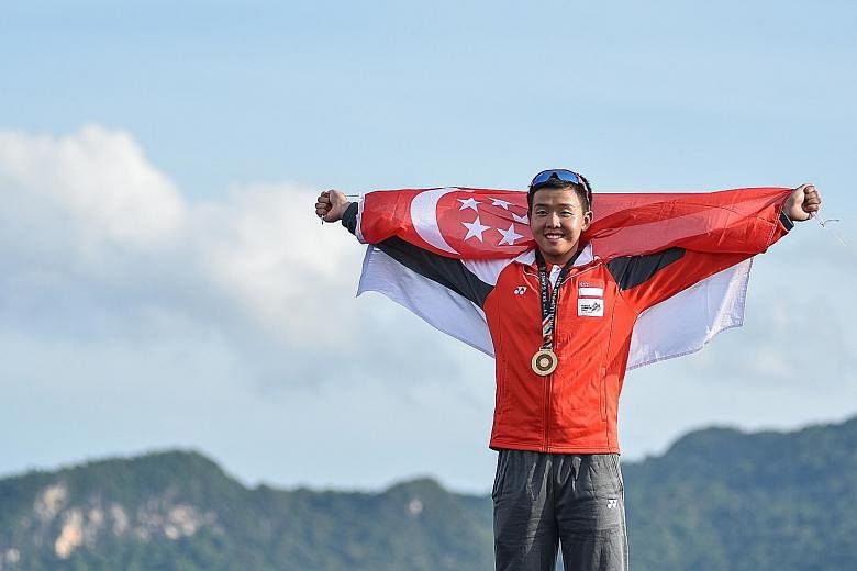 Above: Singapore's Ryan Lo celebrating his Laser Standard gold medal. It was his first SEA Games individual title from two appearances at the biennial event. Left: Jillian Lee rejoicing after winning the Laser Radial gold. She led from start to finis