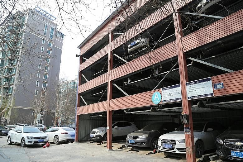In some cities, million-yuan parking spaces are sold with an apartment worth as little as 2.4 million yuan, in bundled deals that make it compulsory for residents to purchase the parking space.
