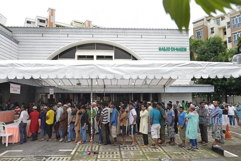 Worshippers at En-Naeem Mosque in Hougang after registering to collect korban meat last year. Korban is a ritual observed on Hari Raya Haji to commemorate Prophet Ibrahim's obedience to God because of his willingness to sacrifice his son Ismail. Meat