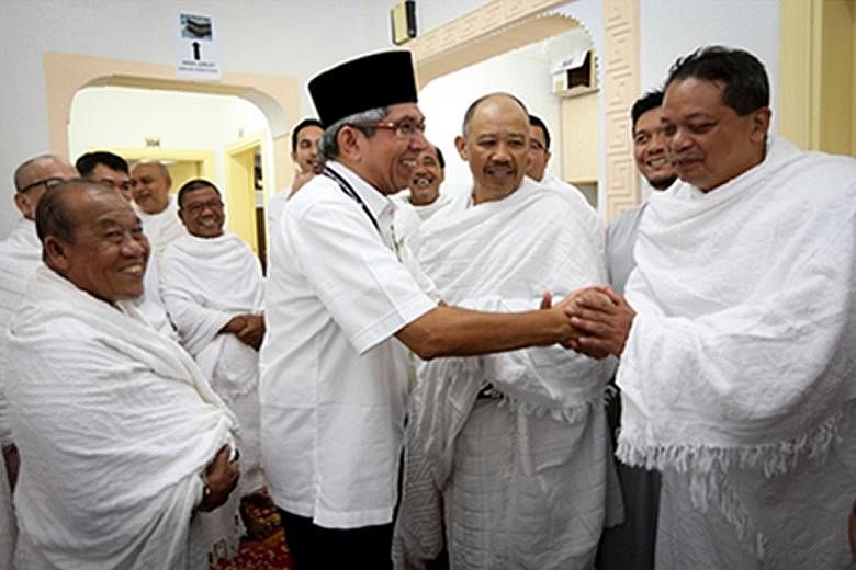 Minister-in-charge of Muslim Affairs Yaacob Ibrahim in Saudi Arabia with pilgrims from Singapore as they prepare for the wukuf, the most important rite of the haj.
