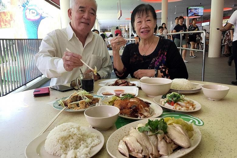 Mr Mah Yap Hong, 76, and his wife, Madam Seow Hee Kiow, 75, a table cleaner, at Tiong Bahru Market and Food Centre. They were indulging because they were eating with relatives. They say their usual diet is healthier.