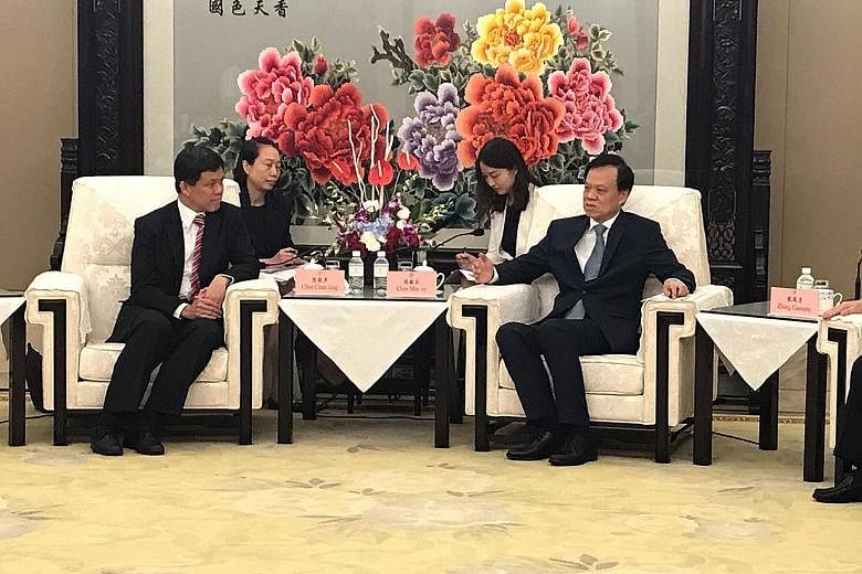 Mr Chan Chun Sing meeting Mr Chen Min'er, Chongqing party chief, in the Chinese city yesterday. The two discussed ways to deepen collaboration over the Chongqing Connectivity Initiative, a Singapore-China joint project to boost regional links.