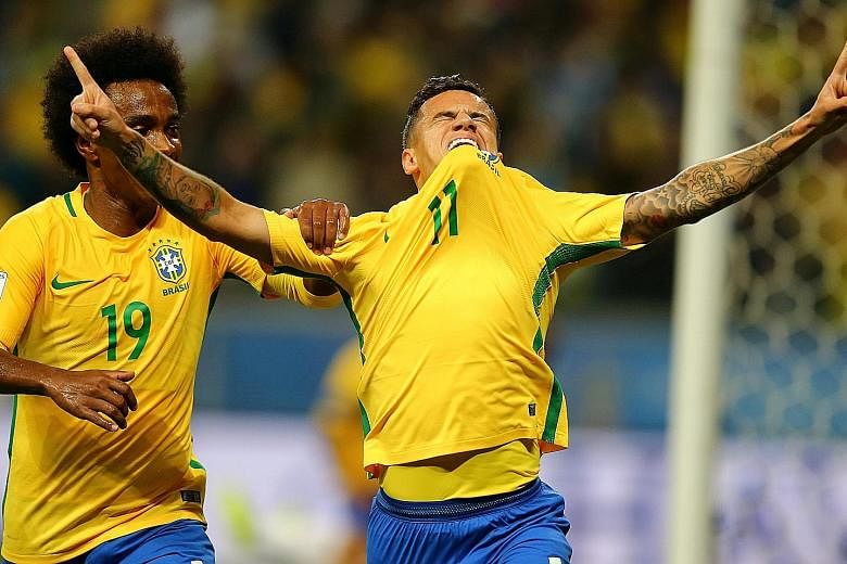 Brazil's Philippe Coutinho gesturing after his 76th-minute goal against Ecuador. He has been at the centre of a tug-of-war between Liverpool and Barcelona.