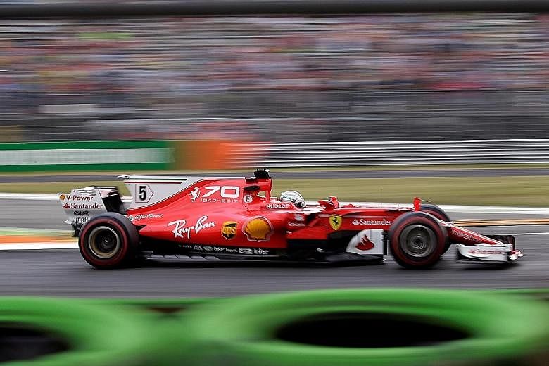 Sebastian Vettel during yesterday's first practice session for the Italian Grand Prix. His car carried special livery commemorating Ferrari's 70th anniversary in Formula One, but the Italian team opted not to switch to their fourth engine of the seas
