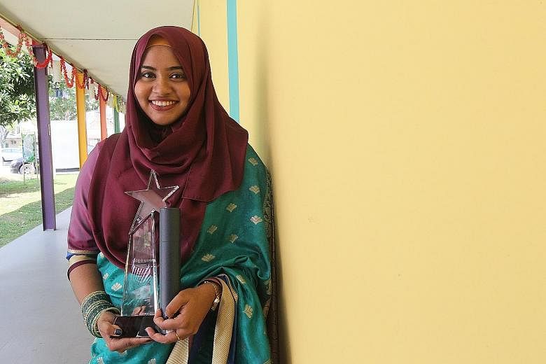 Miss Noorul Wasima, 23, won the Best NIE Trainee Teacher Award at the Most Inspiring Tamil Teacher's Award ceremony yesterday.