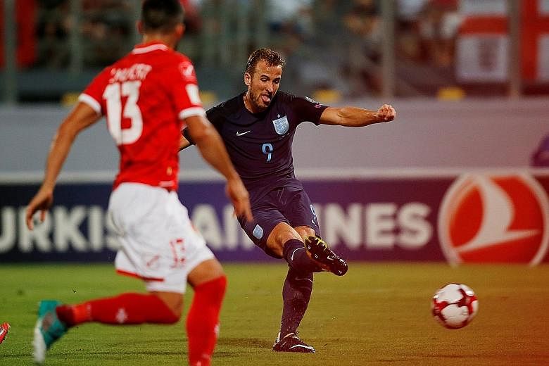 Harry Kane scoring the first of his two goals in England's 4-0 victory against Malta last Friday. The striker now has five goals in his last three international outings and his form will be crucial to manager Gareth Southgate's tactics in today's Wor