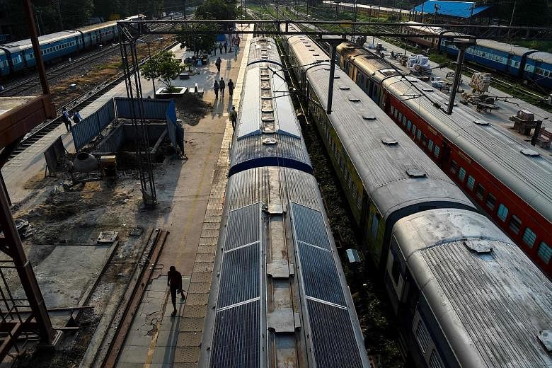 A solar-powered train parked at Sarai Rohilla railway station in New Delhi. India is trying to reduce its massive carbon footprint and modernise its vast colonial-era rail network.