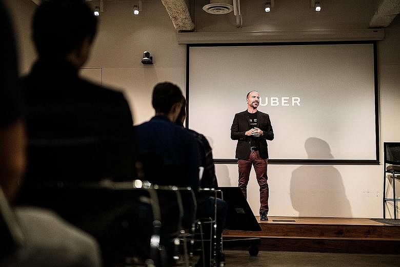 New Uber chief executive Dara Khosrowshahi at his first company meeting as CEO, where he told employees: "This company has to change. What got us here is not what's going to get us to the next level."