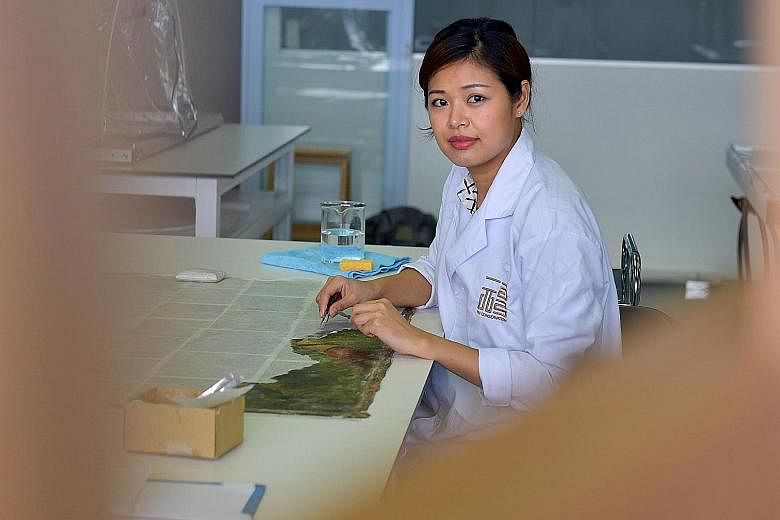 Get tips on how to keep paintings safe at a workshop conducted by art conservator Hera Chen (above).