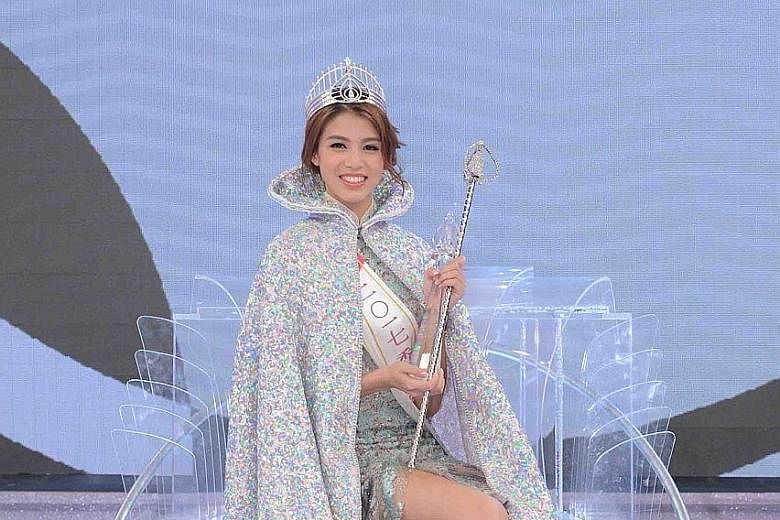 Actress Juliette Louie won the Miss Hong Kong title after TVB host Carol Cheng cast two deciding votes for her.