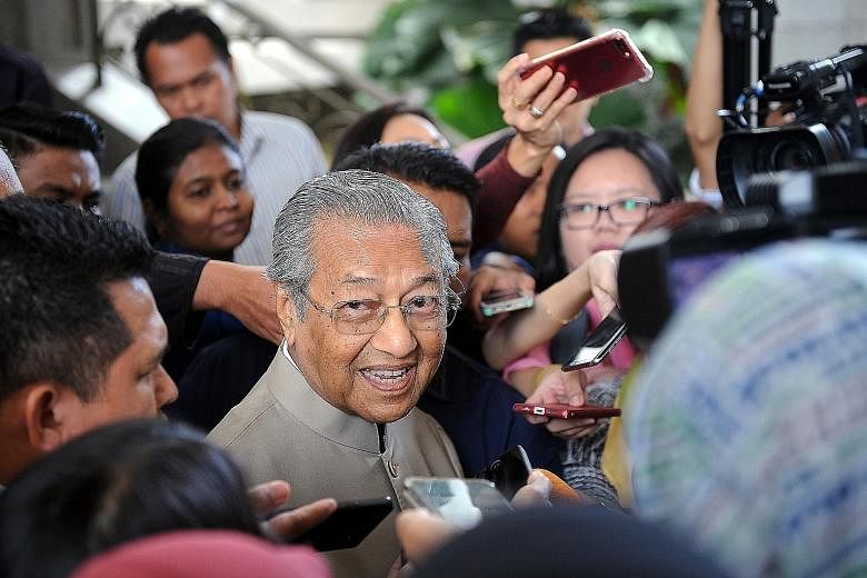 Dr Mahathir Mohamad speaking to reporters in Putrajaya on Aug 24, after attending a hearing of the Royal Commission of Inquiry probing foreign exchange losses suffered by Bank Negara Malaysia in the 1990s. Talk is heating up of the formation of anoth