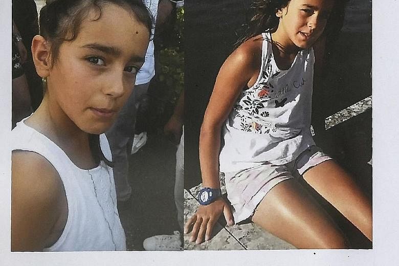 Police officers searching for evidence in Pont-de-Beauvoisin, south-eastern France, last Wednesday, after the disappearance of nine-year-old Maelys de Araujo (below, in an appeal for witnesses poster).