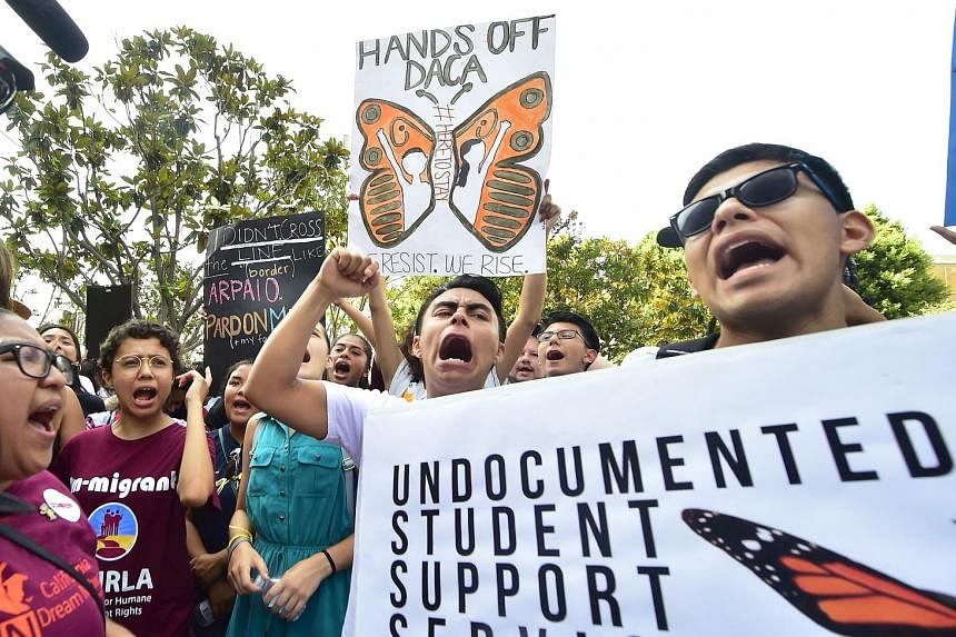A rally in support of Deferred Action for Childhood Arrivals (Daca) in Los Angeles, California, last Friday. Daca is a policy that protects nearly 800,000 immigrants, called "Dreamers", who came to the US illegally as children, from deportation and a