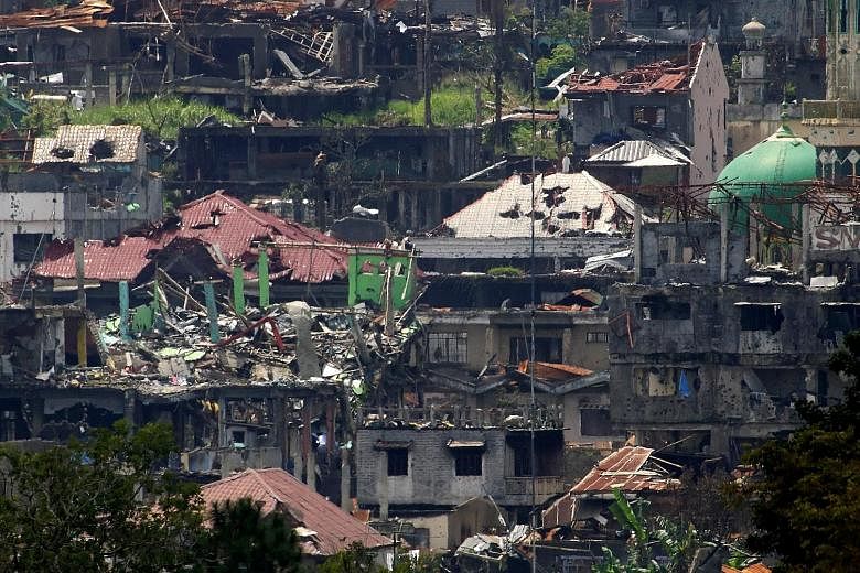 Fighting in Marawi was intense yesterday, with heavy gunfire and explosions ringing out across the once-picturesque lakeside town, the heart of which has been devastated by near-daily government air strikes.