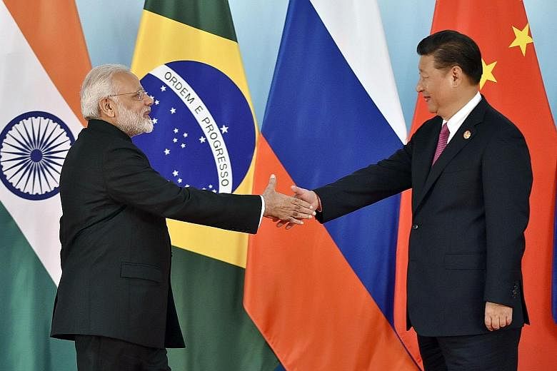 Indian Prime Minister Narendra Modi and Chinese President Xi Jinping at the summit in Xiamen on Monday.