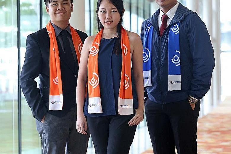 Newly appointed Singapore Workplace Safety and Health Youth Champions (from far left) Clifford Kwok, 18, Rebekah Peh, 24, and Raden Wirano Gatot, 18. They will be trained in safety and health concepts which they can impart to their peers.