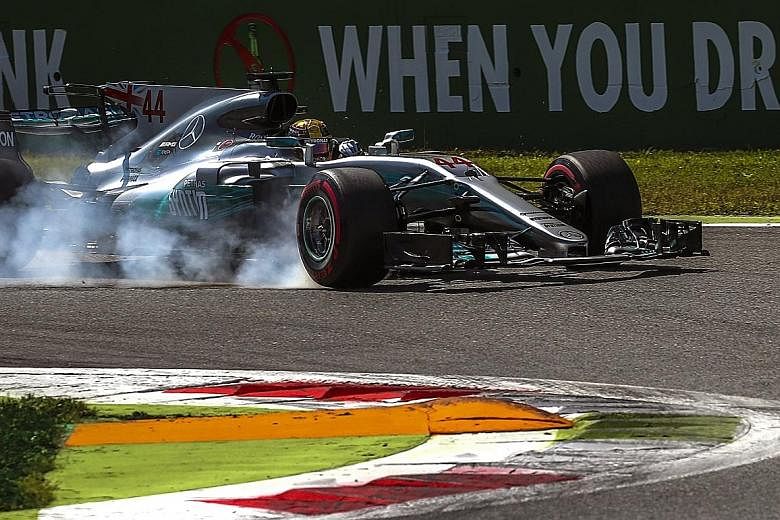 Lewis Hamilton locking up on the way to victory at Monza last Sunday. The Briton, who has struggled with tyre set-up this season, is sparing no effort in his attempt to win another world title.