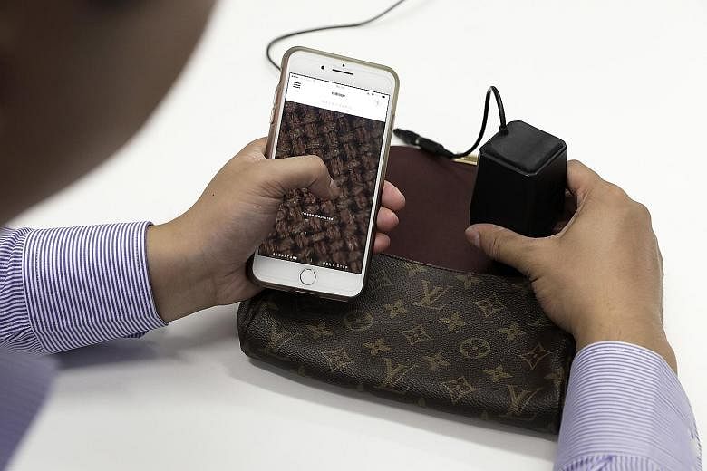 New York start-up Entrupy's handheld microscope lets anyone with a smartphone check a luxury accessory within minutes.