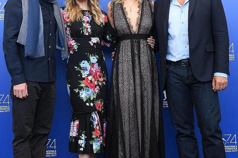 (From left) Director Darren Aronofsky with actresses Michelle Pfeiffer and Jennifer Lawrence, who star in mother!, at the Venice Film Festival on Tuesday.