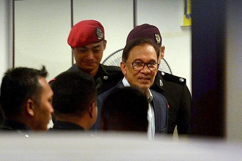 Anwar Ibrahim, who is serving jail time for sodomy, appeared before the Royal Commission of Inquiry yesterday under heavy police guard. He said the figure that he told the Cabinet, led then by prime minister Mahathir Mohamad, was based on discussions