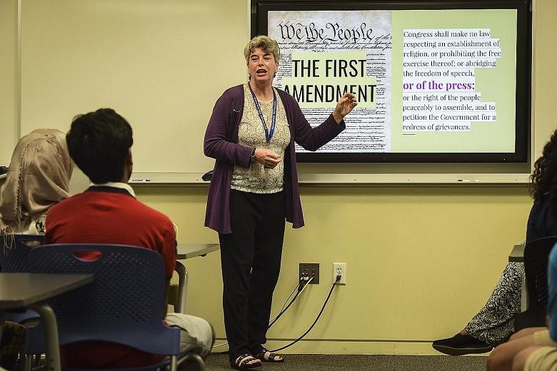 Ms Kim Ash teaching the Newseum's Fighting Fake News class. Teachers in the United States are increasingly concerned that their students will grow up not believing anything they read, or believing the difference between what is real and what is fake 