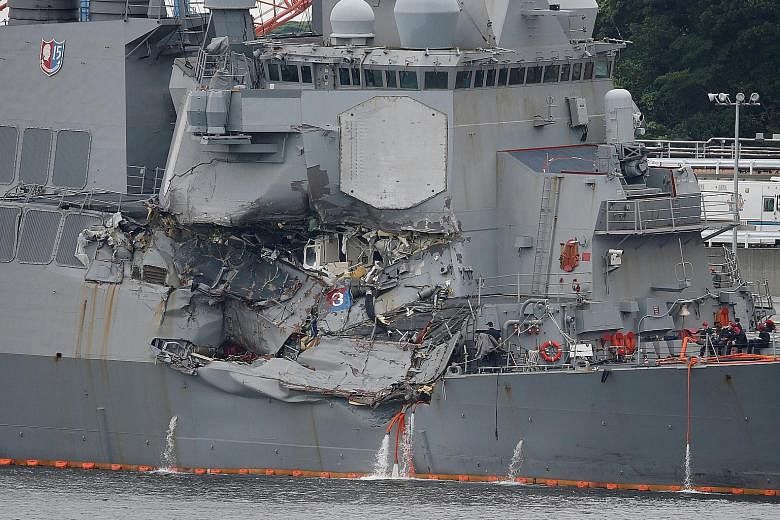 The USS Fitzgerald, after colliding with a Philippine-flagged merchant vessel, at the US naval base in Yokosuka, Japan, in June. Contrite navy officials have conceded that they accepted increasing risks with uncertified ships and crews, despite repea