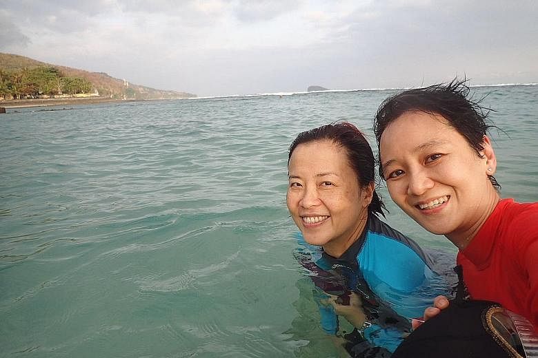 Dr Wong Yu Yi (right) with her friend, Ms Yap Shu Mei, who was with her during the fatal diving trip to Bali. Dr Wong went diving several times a year, did underwater photography, and enjoyed visiting hard-to-reach places to see the marine life.