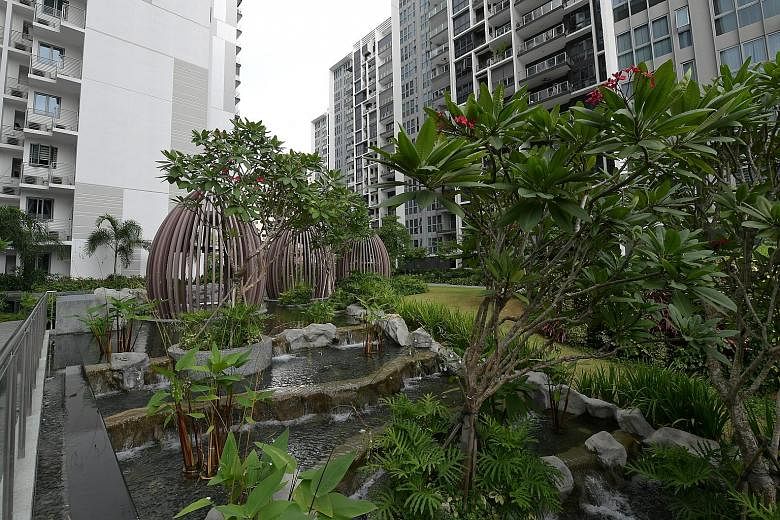 Mr Chiew's penthouse property in the Bartley area. His dream home, he says, would preferably be a landed property in a quiet, central part of Singapore, with room for about six people. Mr Eric Chiew, 33, and his wife Janet Tay, 32, in the three-bedro