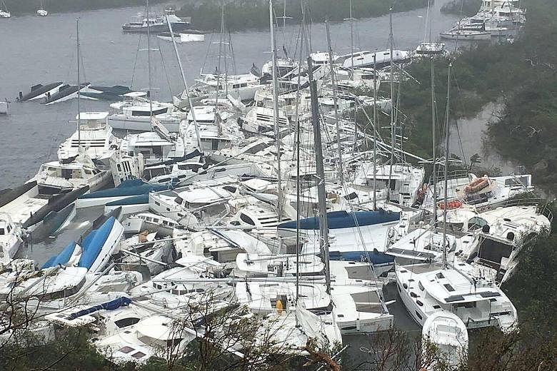 Police patrolling a street in San Juan, Puerto Rico, last Wednesday as Hurricane Irma slammed across islands in the northern Caribbean. Pleasure craft lying crammed against the shore in Paraquita Bay as the eye of Hurricane Irma passed Tortola, on th