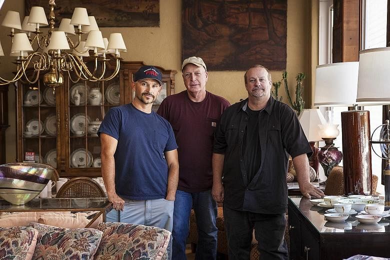 Mr David Van Auker (right, with his antique shop co-owners Buck Burns, left, and Rick Johnson) discovered Woman-Ochre, a work by Willem de Kooning, at the home of the late Jerome Alter.
