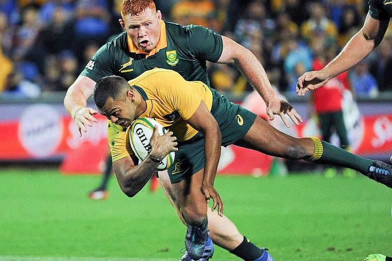 Australia's Kurtley Beale charging through the Springboks' backline. The Wallabies will again turn to their standout player ahead of Saturday's Test against Argentina.