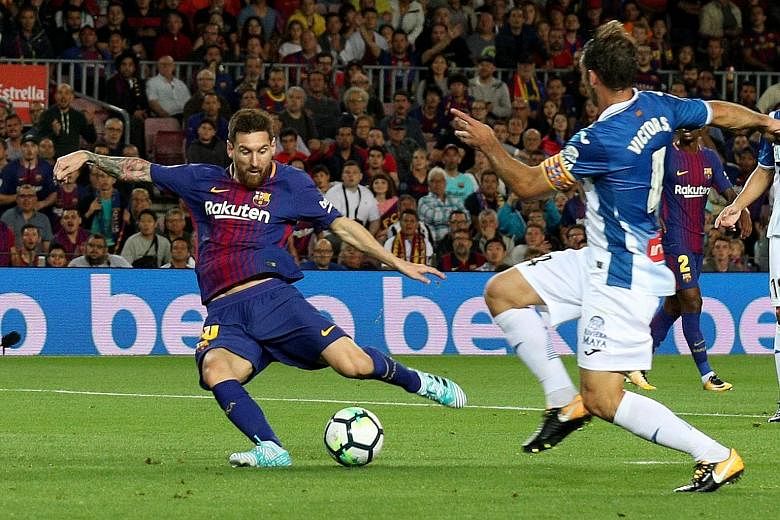 Lionel Messi scoring his first goal in the emphatic 5-0 victory over local rivals Espanyol in their LaLiga encounter on Saturday.