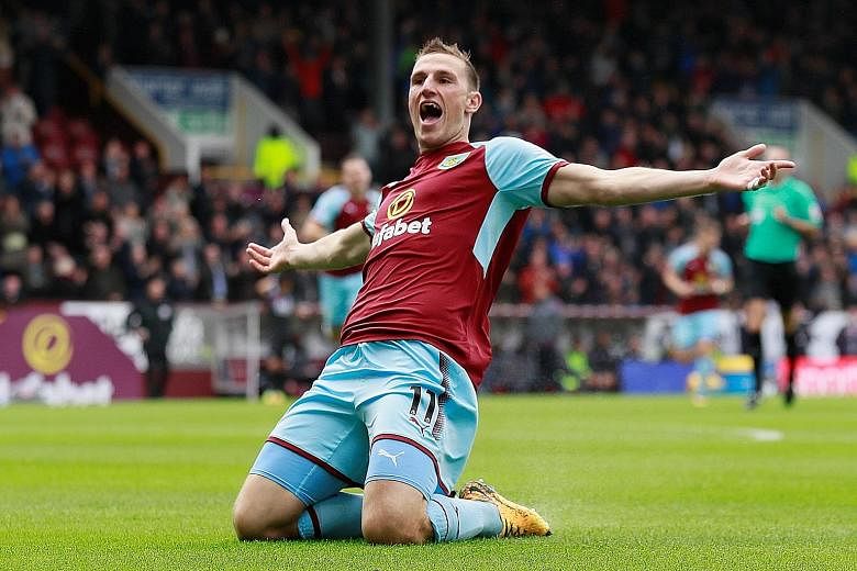 Burnley striker Chris Wood celebrating his third-minute goal, making it two goals in two league appearances for the Clarets. It proved to be the winner against Crystal Palace.
