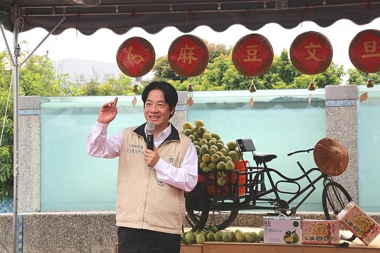 Former mayor of Tainan, Mr William Lai Ching-te, promoting pomelos for farmers on Sept 2. He was dubbed "No. 1 mayor" for balancing the budget, putting in place effective flood control measures and establishing a city transportation network.