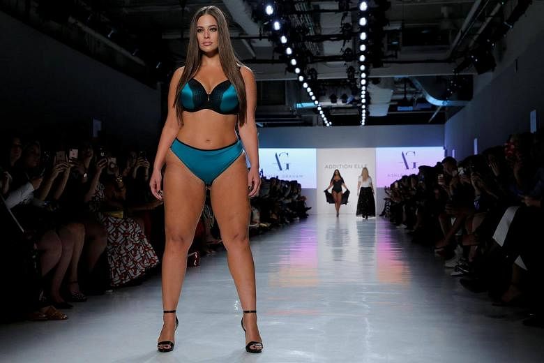 Plus-size model Ashley Graham celebrates sexy curves on NY runway