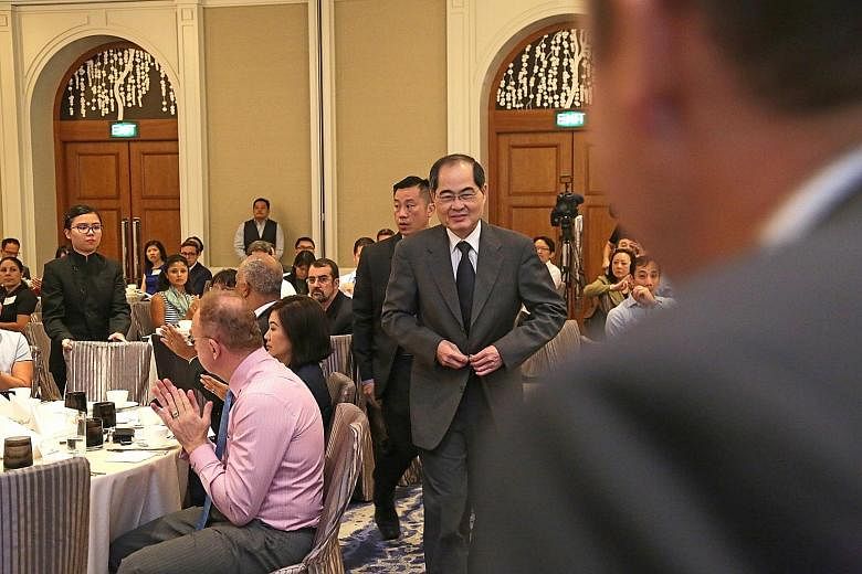 Mr Lim at the Four Seasons Singapore hotel yesterday for the launch of poll results from the 2018 Asean Business Outlook Survey.