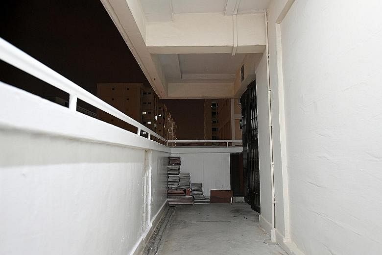 Madam Halimah Yacob's home of two adjacent HDB flats, bought on the resale market, is nestled in a cluster of HDB blocks and tucked away in a neighbourhood that looks like any other. The corridors are cluttered with the everyday items of HDB life.
