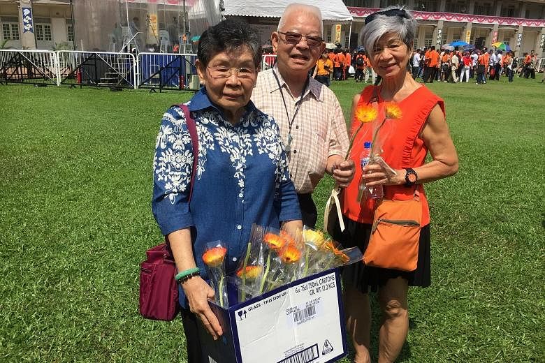 Mr Koh Heong Hwee, his wife Goh Lian Choo (left) and fellow Buona Vista CC member Theresa Toh at the nomination centre yesterday.