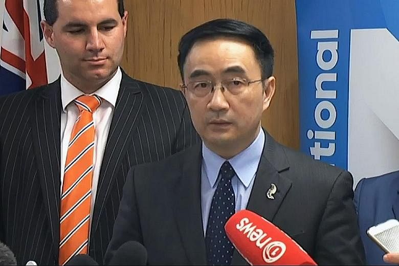 Dr Yang Jian, a China-born MP for the ruling National Party since 2011, speaking to the media yesterday. He said the allegations of his being a spy for Beijing are part of a "smear campaign" to damage him and his party before New Zealand's general el