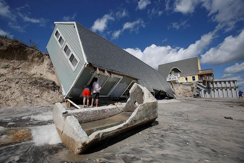 A collapsed coastal house in Vilano Beach, Florida, on Tuesday after Hurricane Irma passed the area. For all the chaos that hurricanes Irma and Harvey brought, the death toll has remained surprisingly contained - about 85 thus far in Florida and Texa