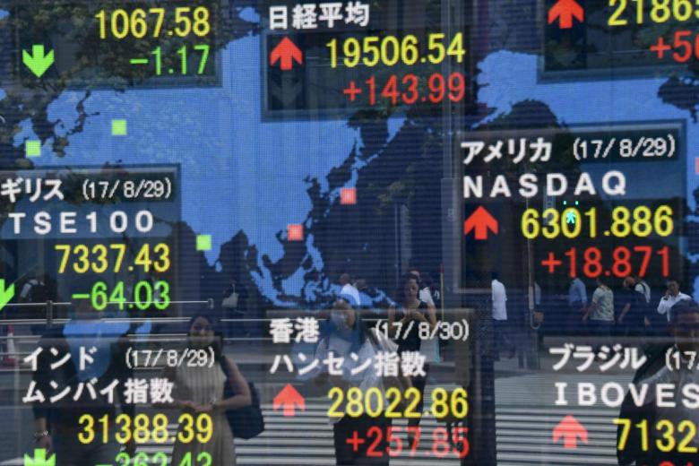 Asia stocks consolidate after touching decade highs, US dollar steady ...