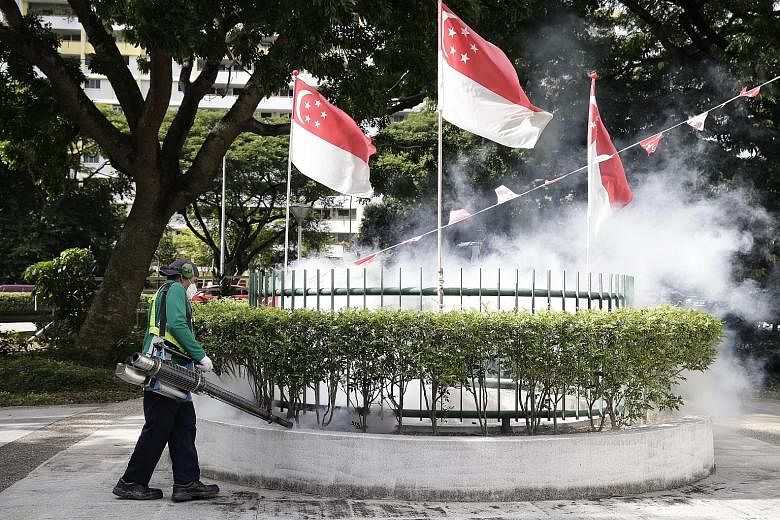 Fogging to kill mosquitoes amid a Zika outbreak last year. Singapore's response to the outbreak has been praised for its efficiency.