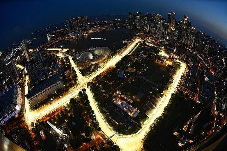 The Marina Bay Street Circuit, seen from Swissotel The Stamford last night, brightly lit up amid final preparations for today's first two practice sessions as the 10th Singapore race weekend gets under way.