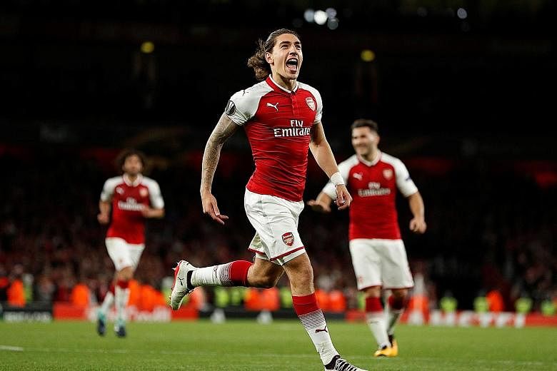 Arsenal's Hector Bellerin celebrating after he scored their third goal against FC Cologne.