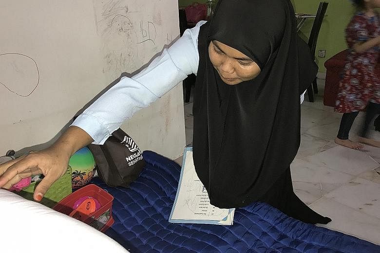 Ever since she started work two months ago, Ms Nor Asma has formed a strong bond with her employer's kids, especially Ahmad Willdan Arjuna Ahmad Fedtri, three. Ms Nor Asma Arifin, who was initially apprehensive about living with strangers, has adjust
