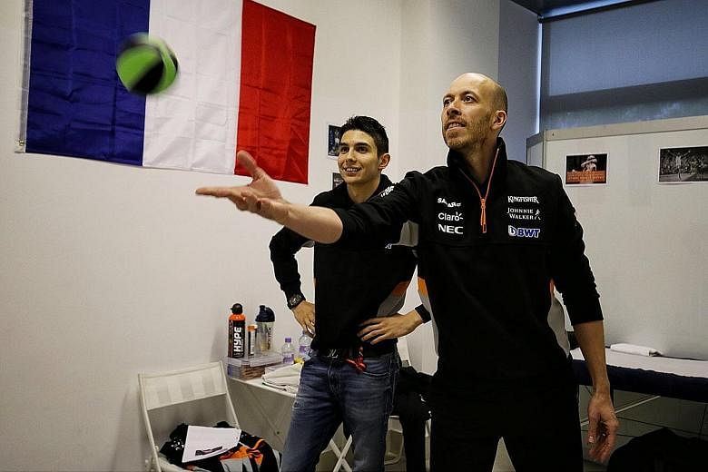 Force India driver Esteban Ocon, 20, training ahead of tomorrow's Singapore Grand Prix. The Frenchman trains at least six days a week and up to six hours a day, with little rest during the off-season.