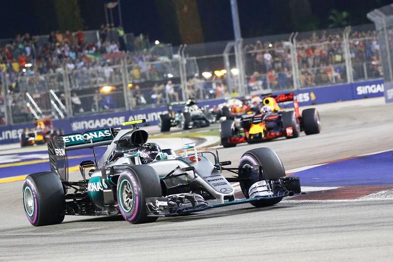 Mercedes driver Nico Rosberg in action at the F1 Singapore Grand Prix last September, when he won in Singapore for the first time. The Grand Prix is a three-day mega event with festivities ranging from concerts featuring international artists to Mich