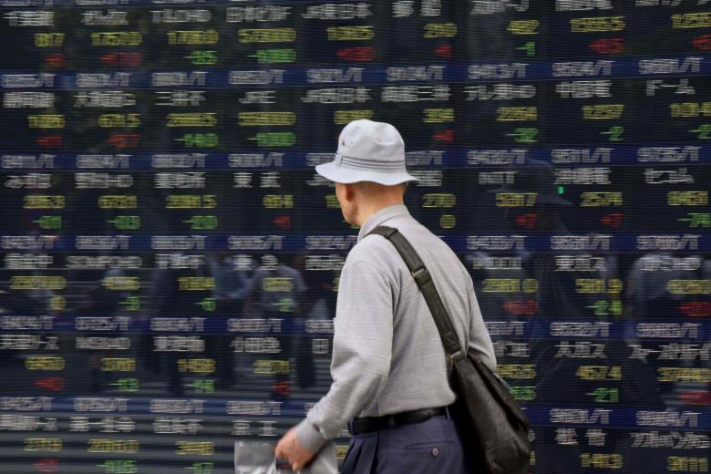 Asia stocks hit decade high, US dollar holds nerve for Fed meeting ...