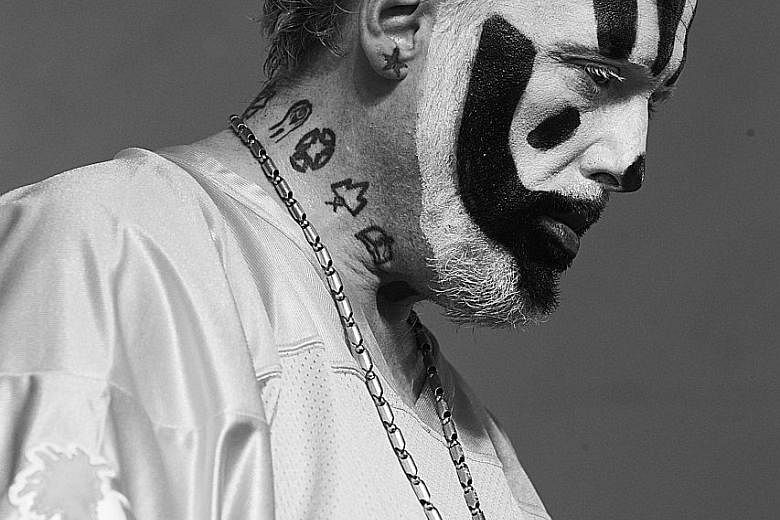 American rap group Insane Clown Posse's fans protesting last Saturday in Washington against the Federal Bureau of Investigation's 2011 decision to classify them as gang members. The group was founded in 1989 by duo Violent J (Joseph Bruce, above) and Shag